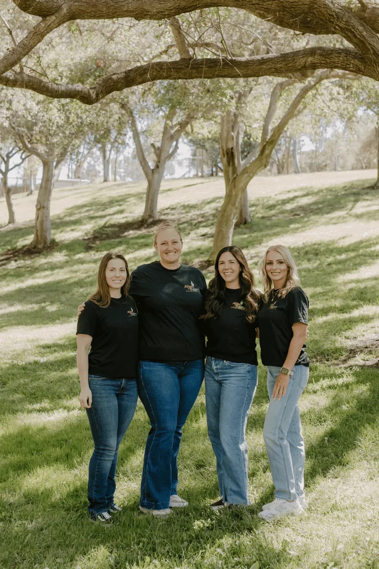 The Atlas in Balance Chiropractic team, your Oceanside chiropractor, smiling together in a park